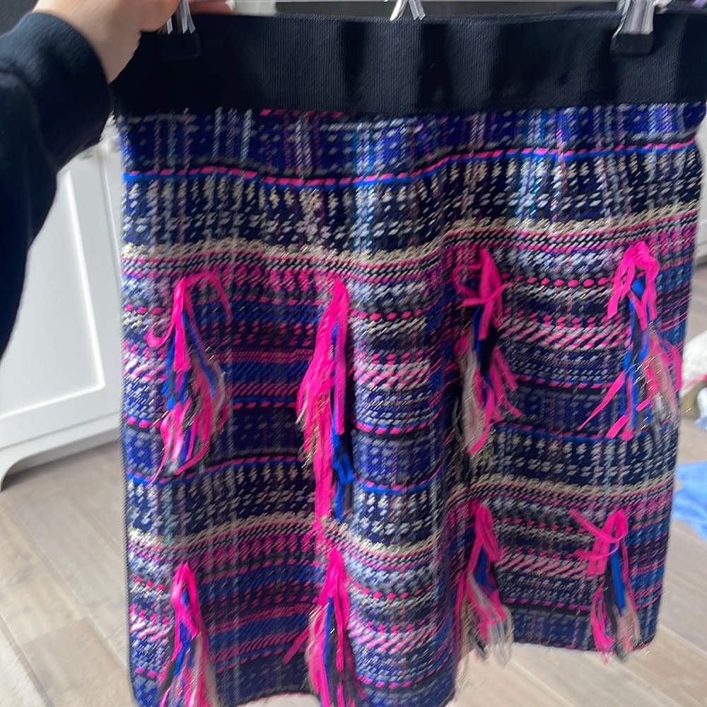 Milly skirt with fringe and satin lining.